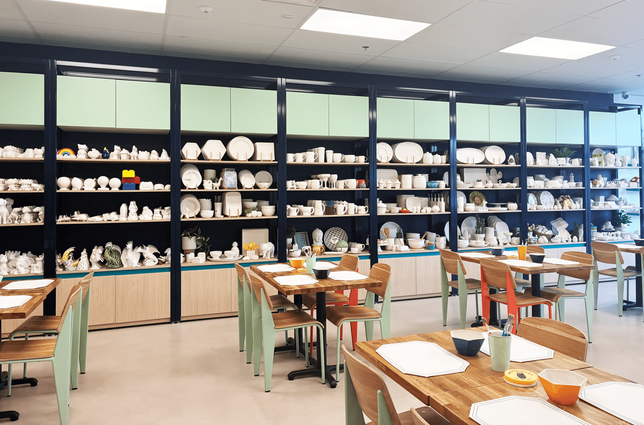 Interior of Color Me Mine showing pieces you can paint