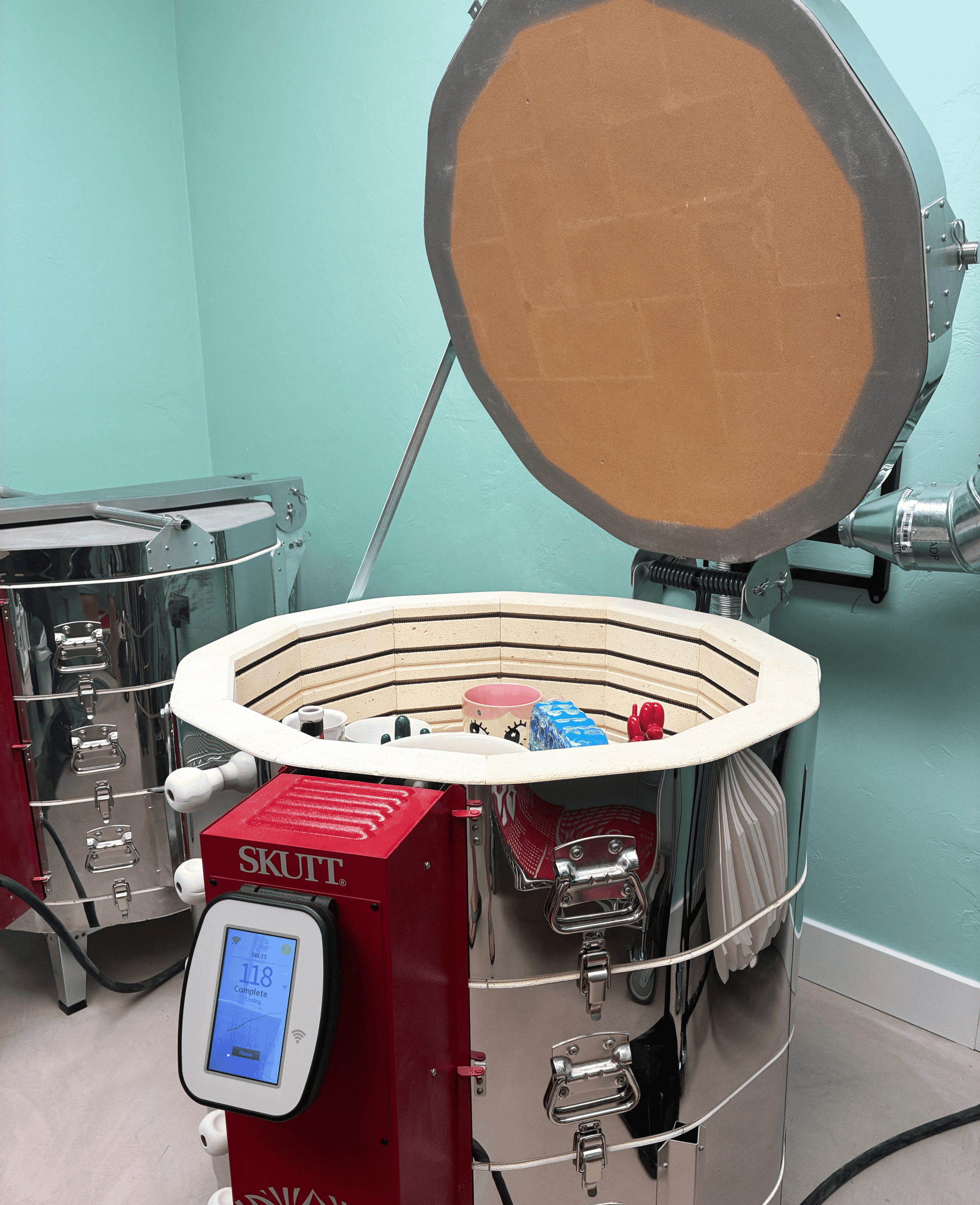 Photo of a kiln with customer pieces inside 